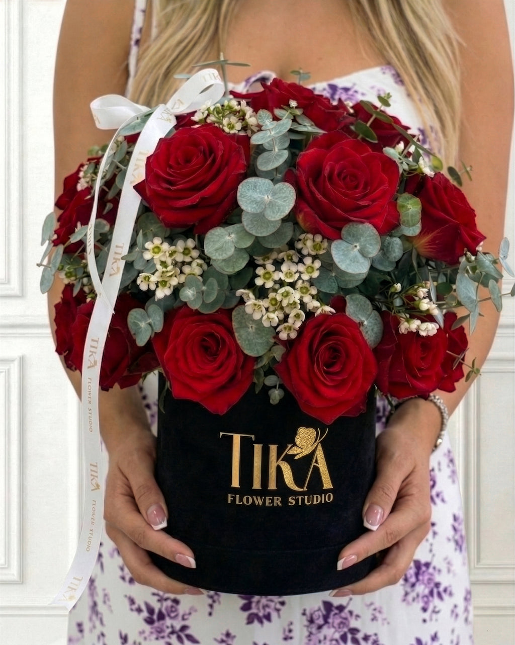 “Charm” roses and eucalyptus box bouquet