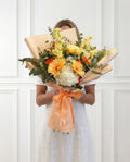 Hand tied bouquet designer’s choice